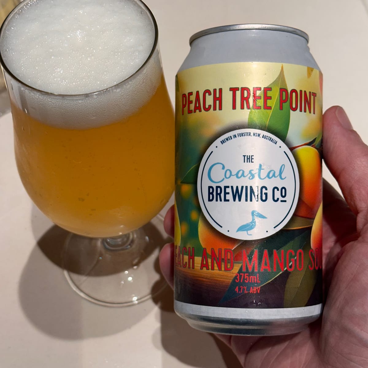 The Coastal's Peach Tree Point Peach and Mango Sour